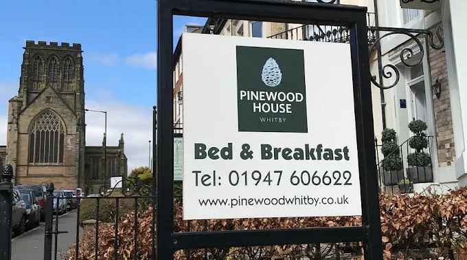 Pinewood House sign on Hudson Street